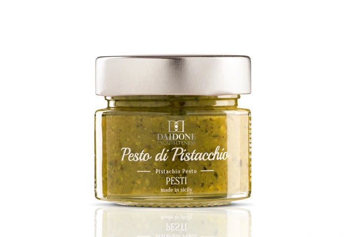 Pistacchio Pesto 80g in a glass jar with a silver lid, made by Daidone Exquisiteness, vibrant green color.